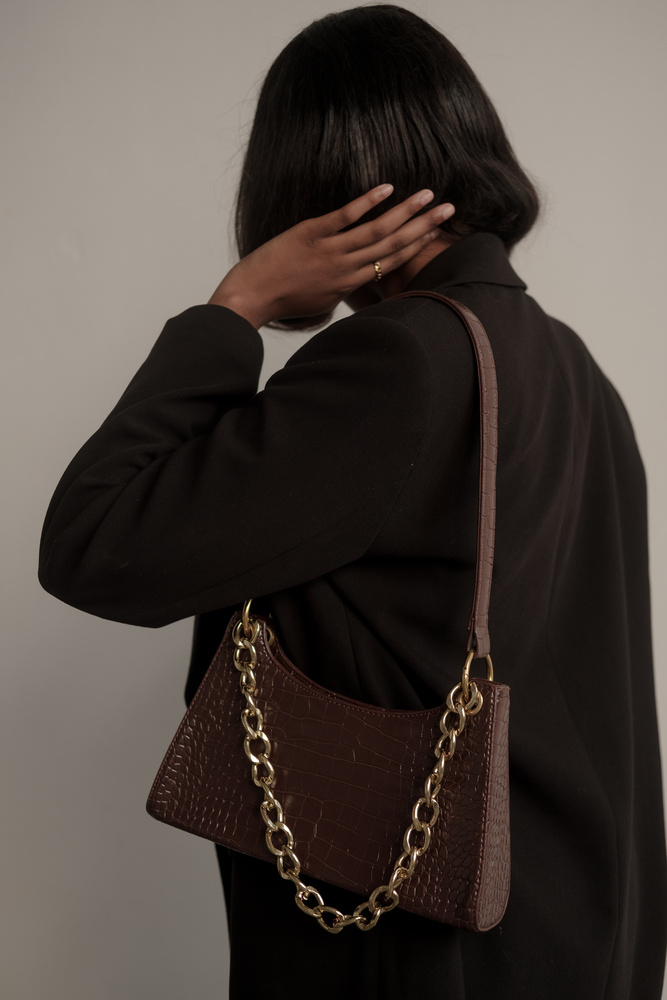 Woman with Black Dress with Handbag